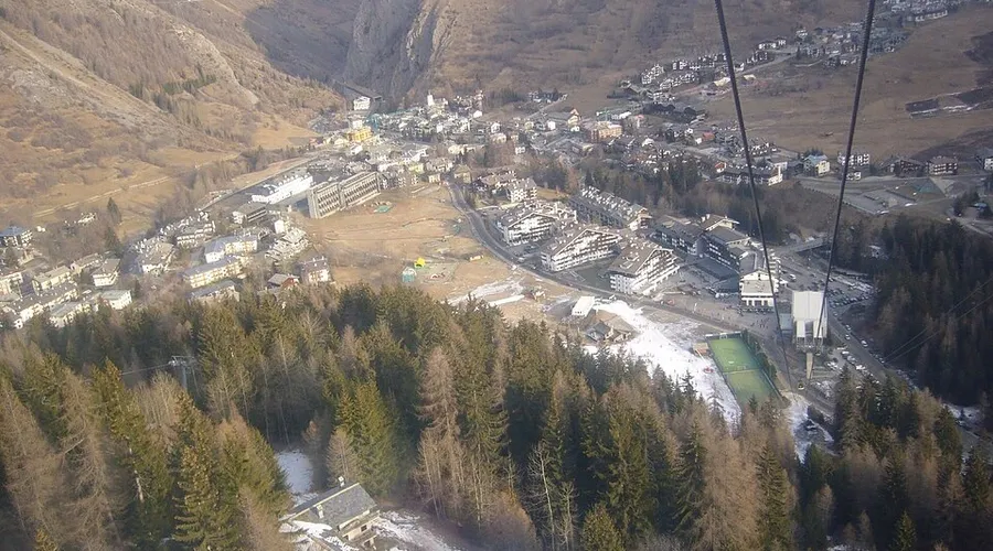 View of La Thuile ski resort from a gondola cable car in the Italian Alps