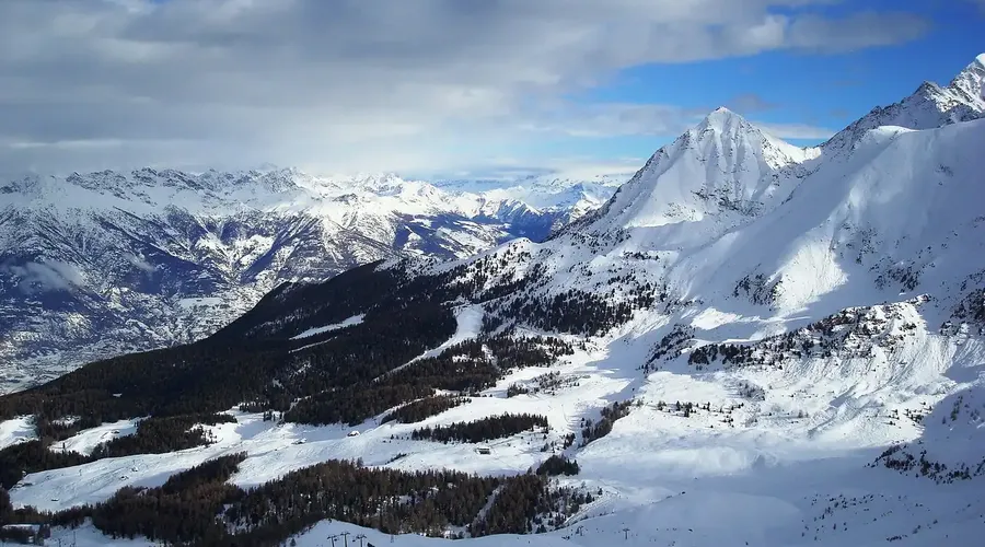 Snow-covered ski slopes and Alpine mountains at Pila ski resort in Italy's Aosta Valley