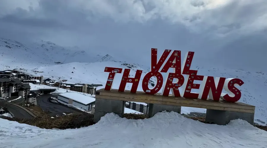 Val Thorens ski resort sign overlooking the snowy village